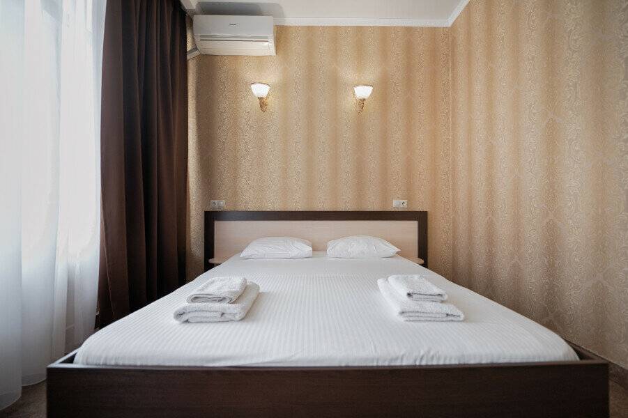 Фотографии номера Делюкс в Гостинице Эллада Лазаревское