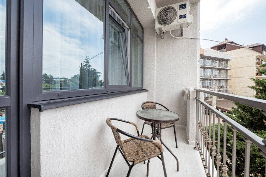 Фотографии номера Апартаменты люкс Gold(с кухней) в Гостинице Эллада Лазаревское