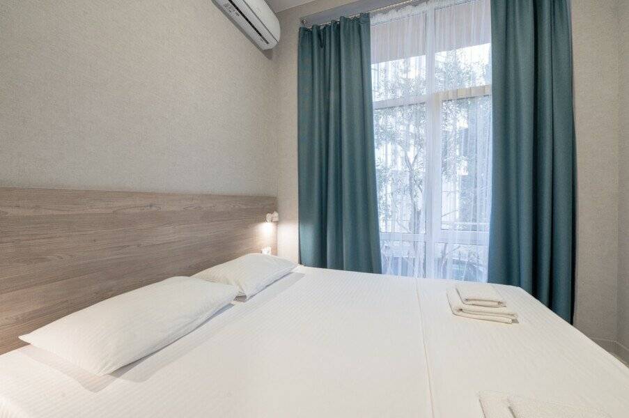 Фотографии номера Стандарт улучшеный в Гостинице Эллада Лазаревское