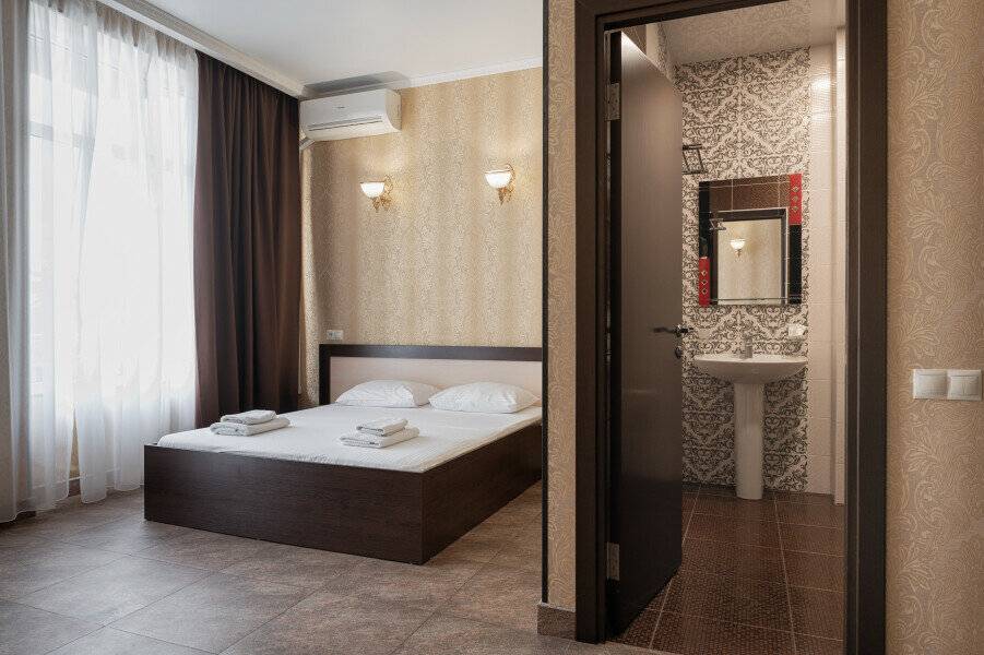 Фотографии номера Делюкс в Гостинице Эллада Лазаревское